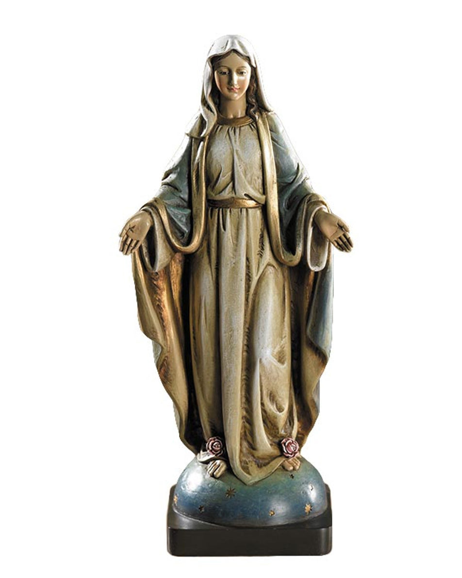 Statue of a religious figure with a white head covering on a white background