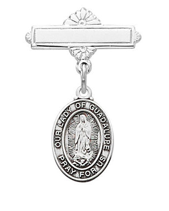 Silver Our Lady of Guadalupe pendant on a white background