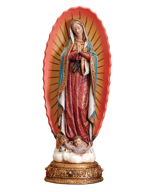 Statue of a religious figure with a red and gold base on a white background