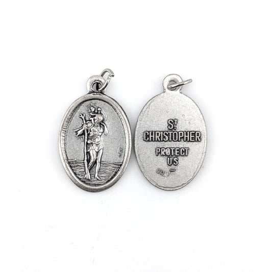 Silver St. Christopher medal on a white background