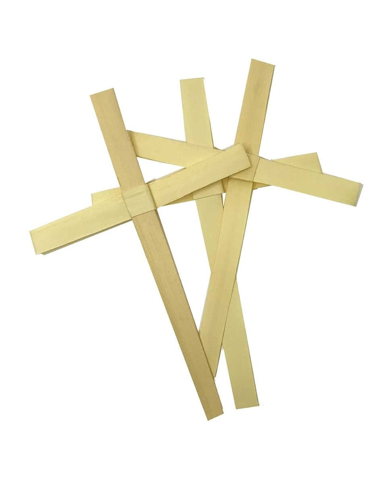 Three yellow wooden crosses on a white background