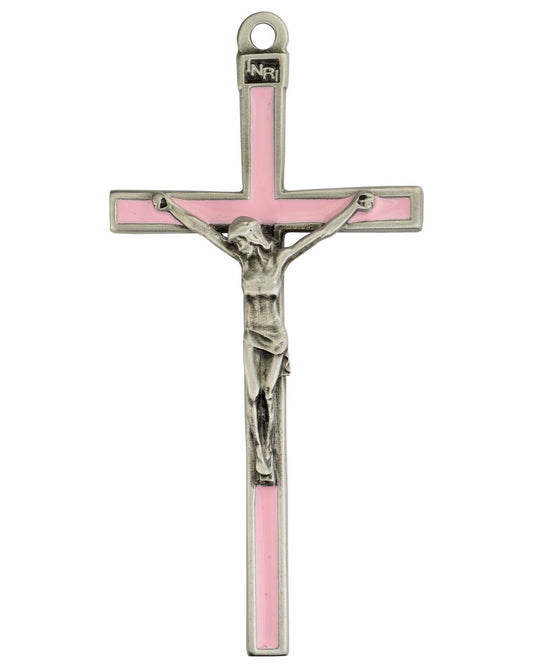 Cross with pink center and silver crucifix on a white background