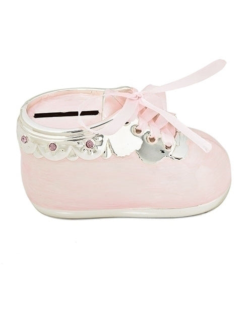 Pink baby shoe with decorative elements on a white background