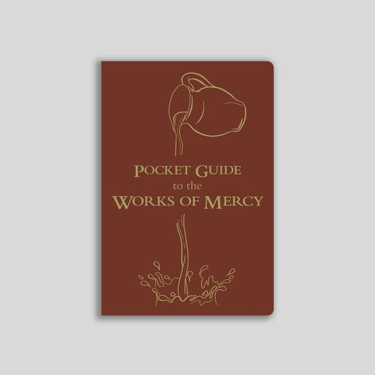 Brown book titled 'Pocket Guide to the Works of Mercy' on a light gray background