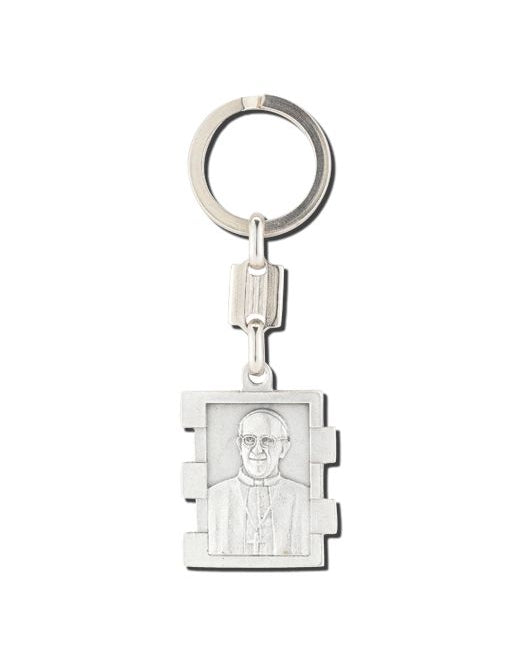 Silver keychain with a rectangular pendant featuring a engraved portrait on a white background