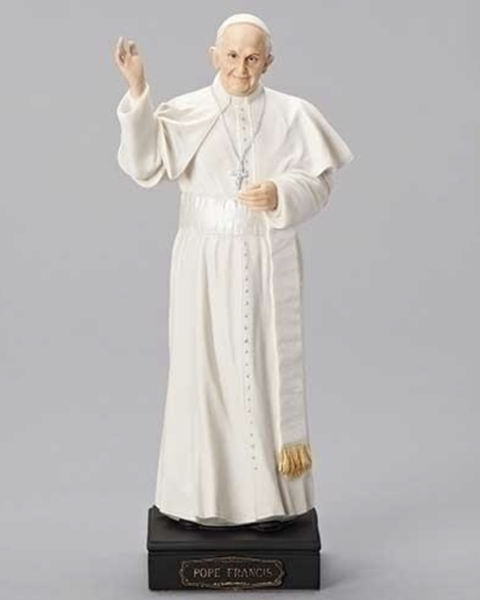 Statue of a religious figure in white robes on a gray background