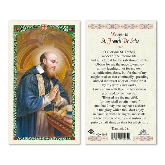 Laminated prayer card with St. Francis de Sales on one side and prayer text on the other, featuring a decorative border.