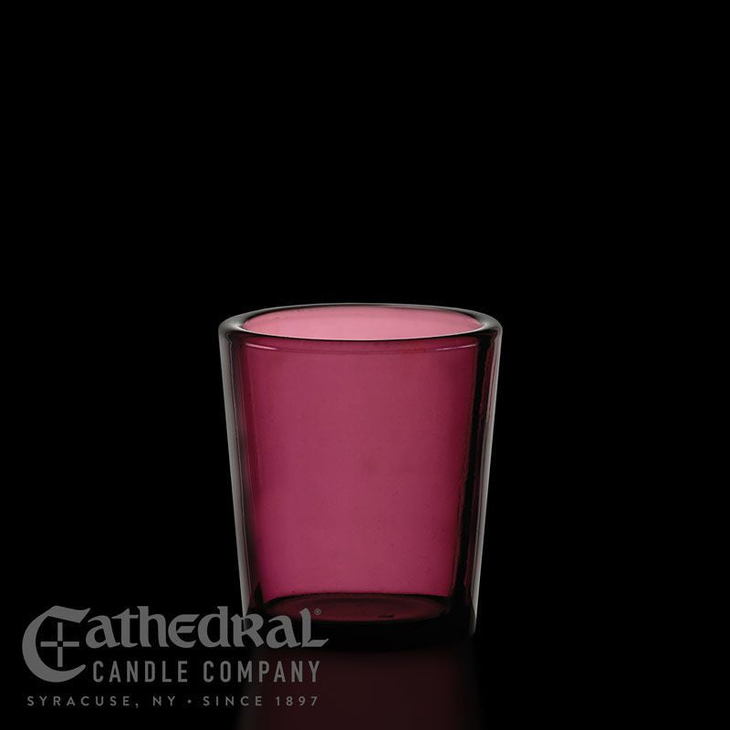Pink candle in a glass holder with Cathedral Candle Company logo on a black background