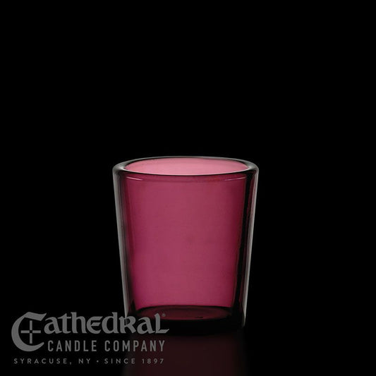 Pink candle in a glass holder with Cathedral Candle Company logo on a black background