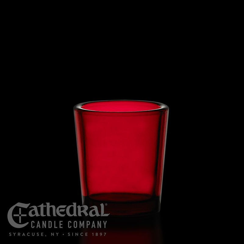 Red glass candle holder with Cathedral Candle Company logo on a black background
