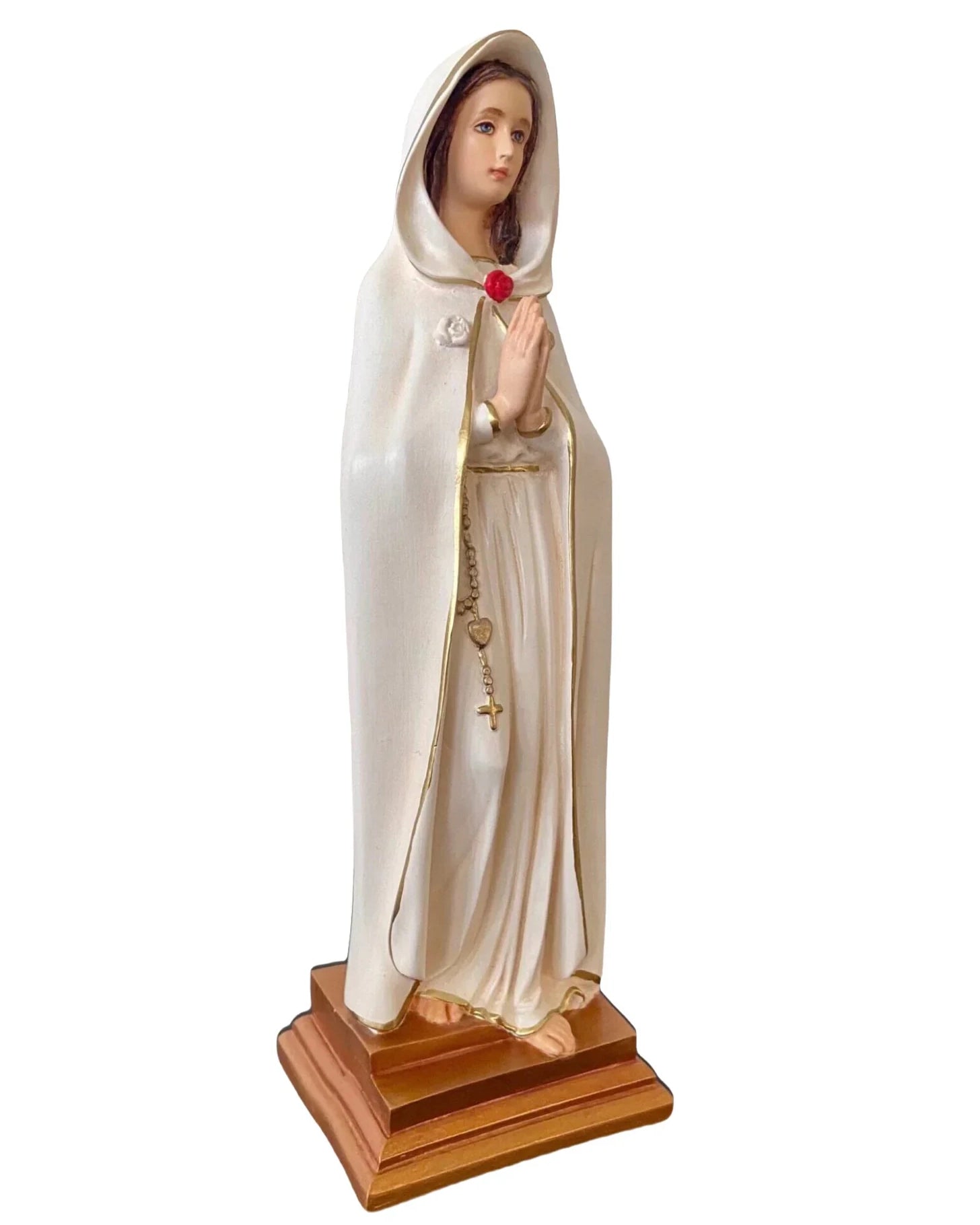 Statue of a religious figure in a white robe with a wooden base on a white background