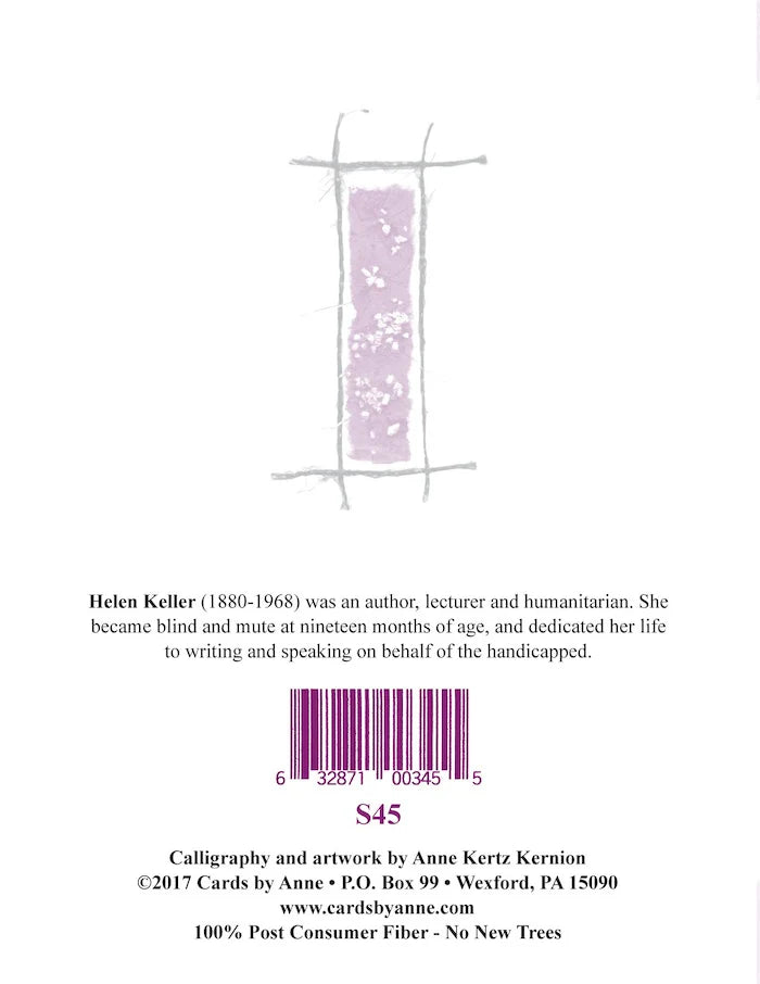 Back of a card with text about Helen Keller and a barcode, featuring calligraphy and artwork by Anne Kertz Kernion.