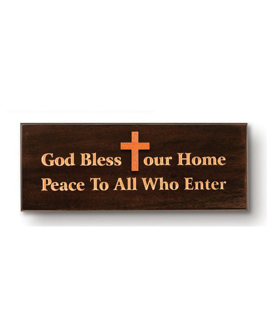 Wooden sign with cross and engraved text on a white background