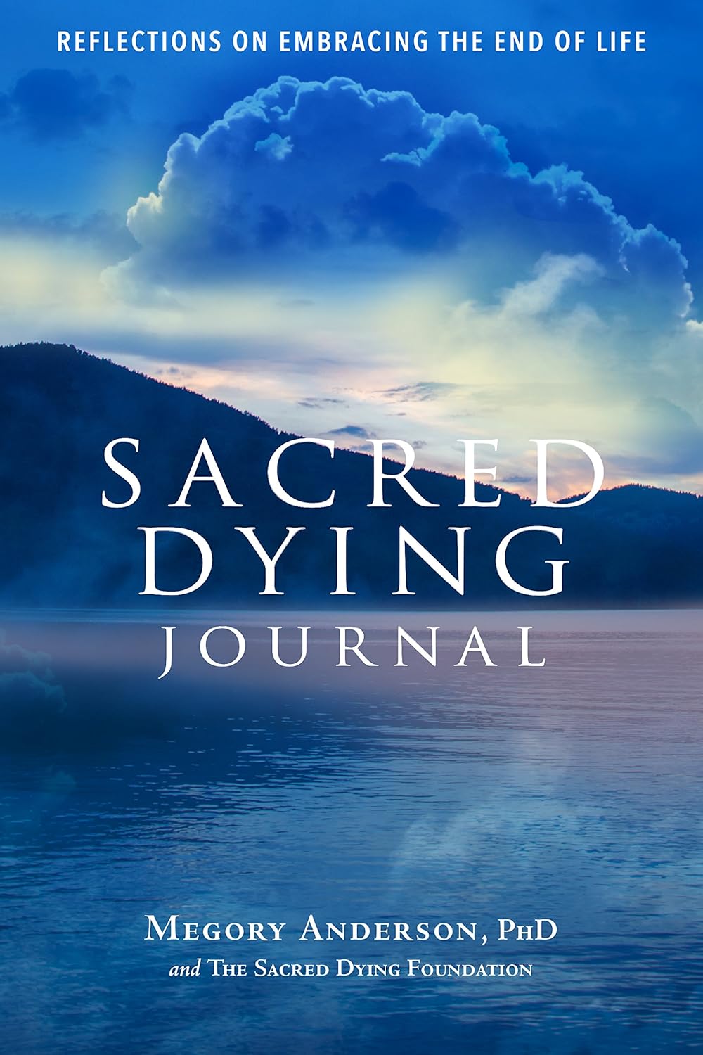 Book cover of 'Sacred Dying Journal' with a scenic mountain and lake background.