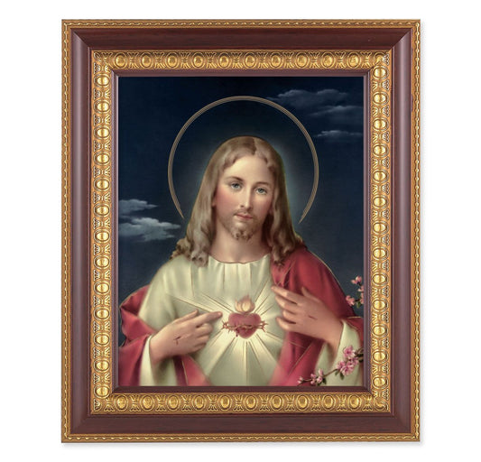 Framed artwork of a religious figure with a decorative border