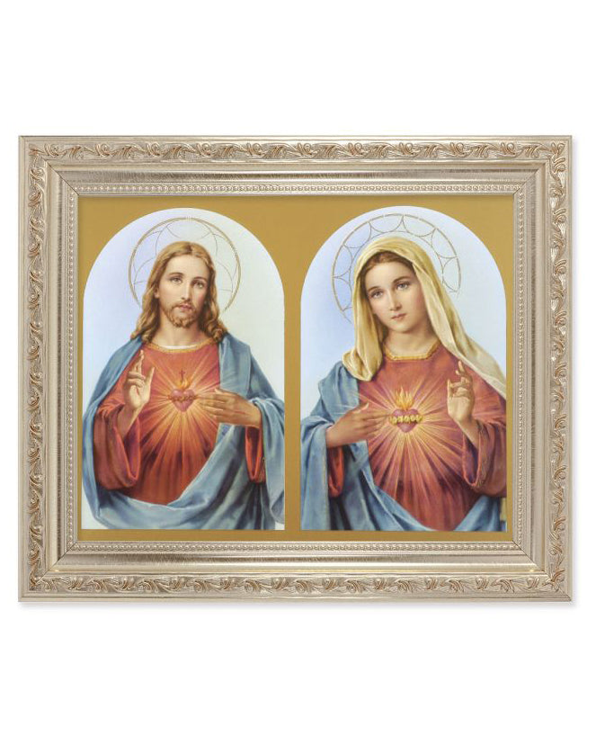 Framed artwork of Jesus and Mary with a gold frame