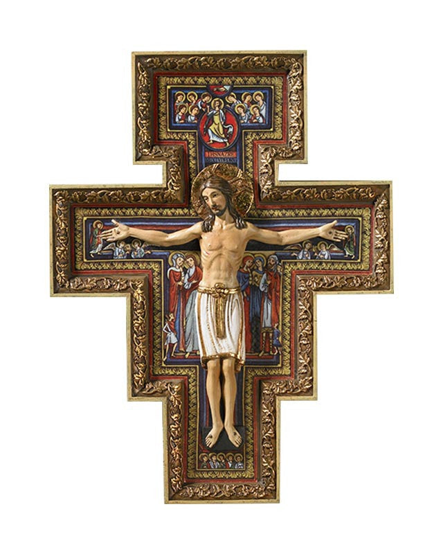 Decorative cross with a religious figure in a gold frame on a white background