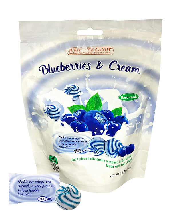 Packaging of blueberry and cream hard candies with a small candy in front.