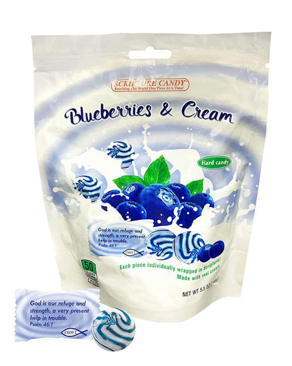 Packaging of blueberry and cream hard candies with a small candy in front.