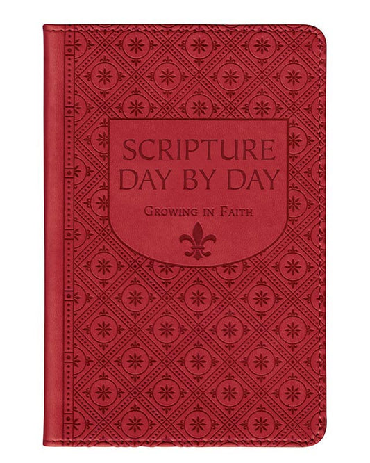 A red leatherette bound book titled 'Scripture Day by Day' with decorative embossed patterns on the cover.