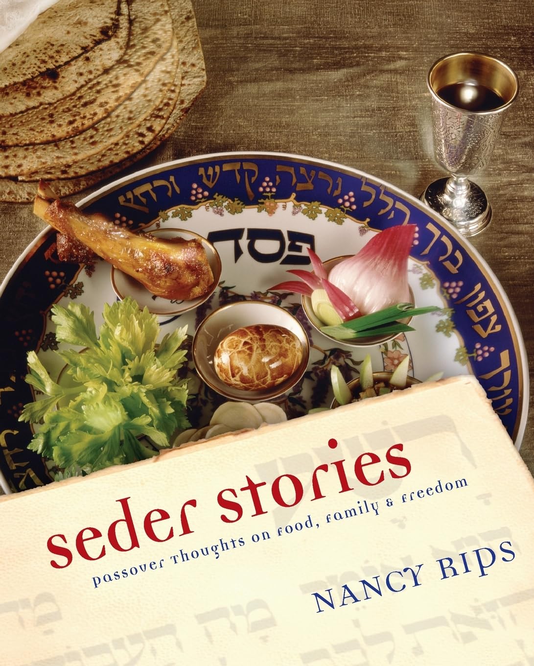 Book cover of 'Seder Stories' with Passover food and Seder plate