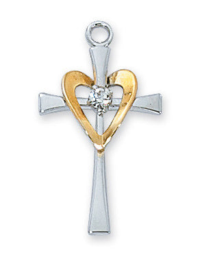 Two-tone cross pendant with heart design and diamond on a white background
