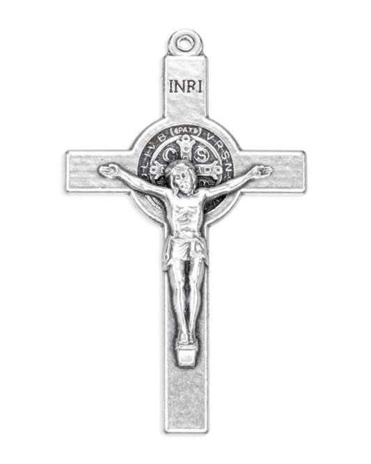 Silver crucifix pendant on a white background