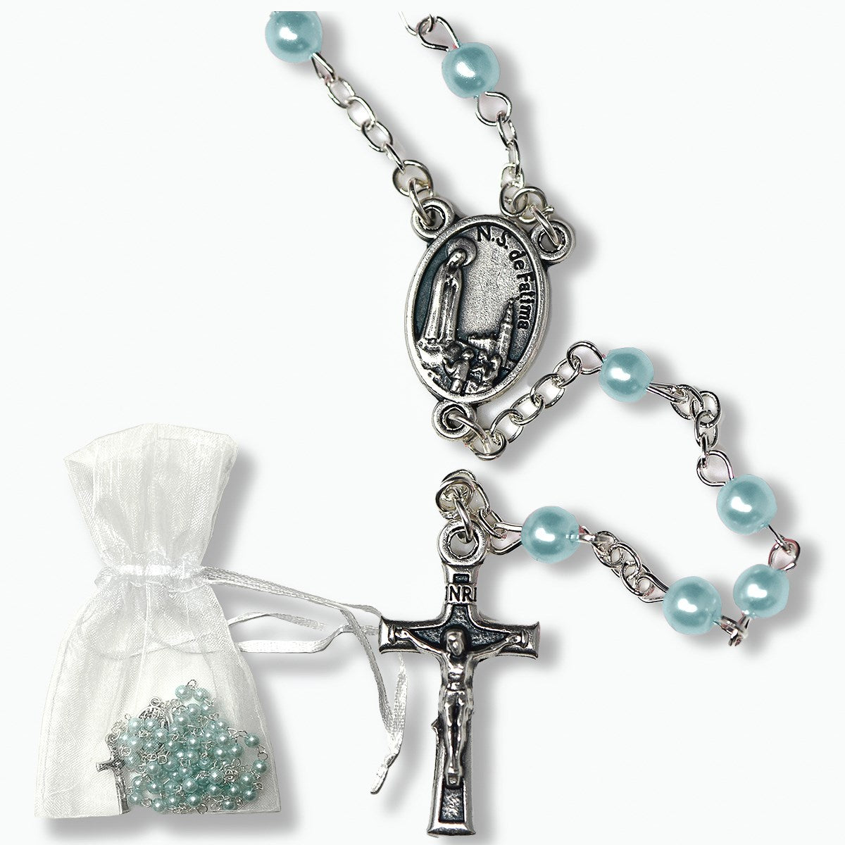 Silver rosary with light blue beads and a white pouch containing more beads on a white background