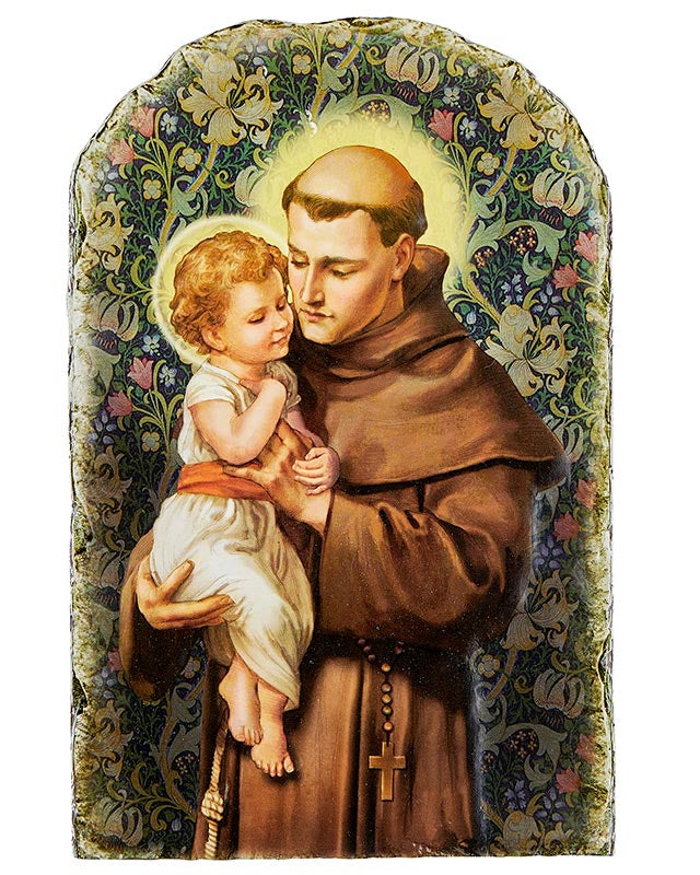 A resin plaque featuring an illustration of St. Anthony holding a child, with a metal stand.