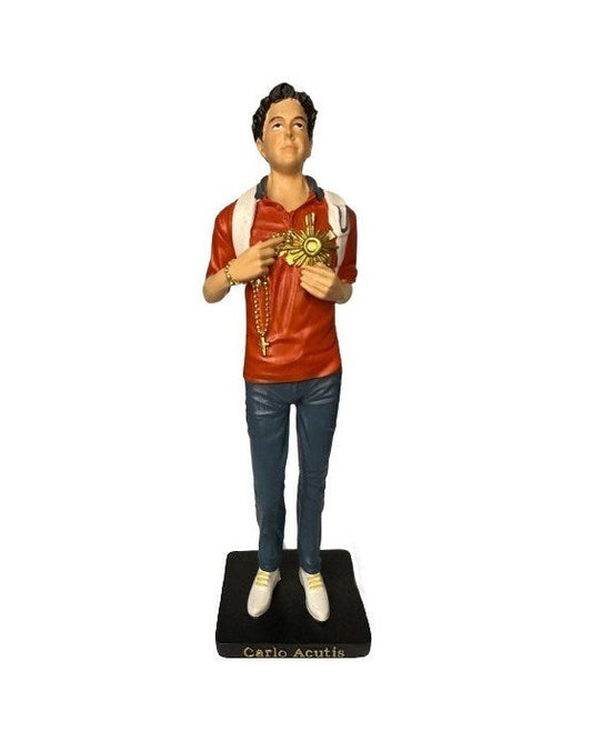 Statue of a person holding a key and a sun-shaped object on a white background