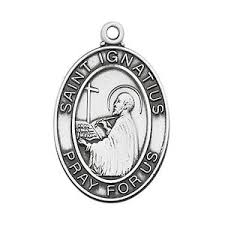 Silver medal with a religious figure and 'Saint Ignatius' text on a white background