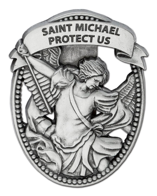 Metallic badge with an angel and 'Saint Michael Protect Us' text on a white background