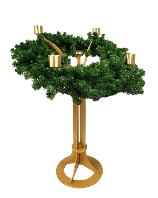 Decorative stand with green wreath and gold candle holders on a white background