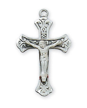 Silver crucifix pendant on a white background