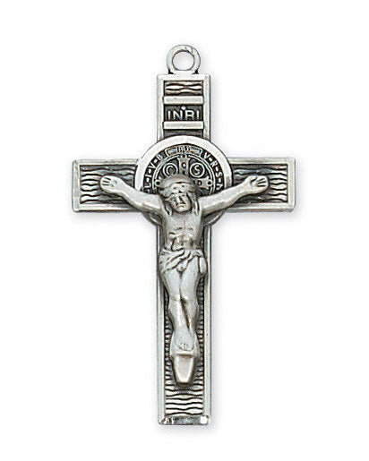 Silver crucifix pendant with Jesus Christ on a white background
