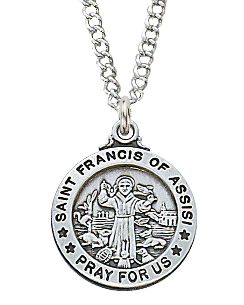Silver Saint Francis of Assisi pendant on a chain against a white background