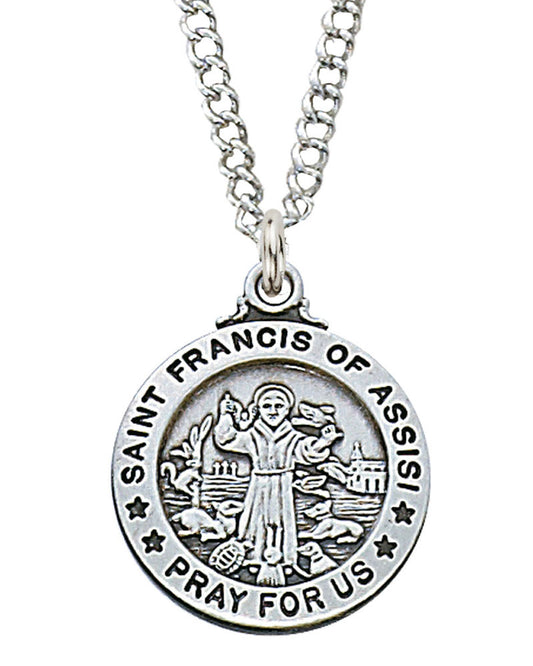 Silver Saint Francis of Assisi pendant on a chain against a white background