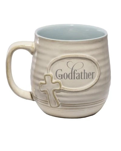 Beige mug with 'Godfather' and cross design on a white background