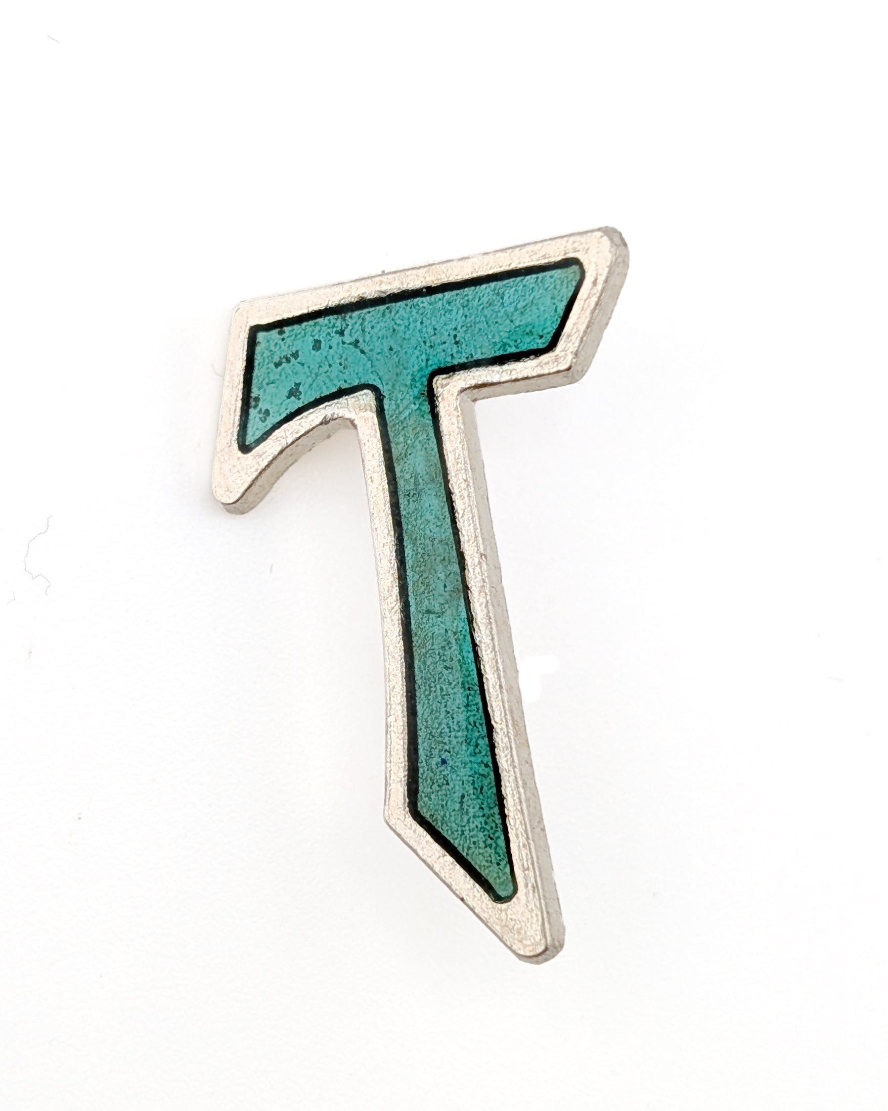 Metallic letter 'T' on a white background
