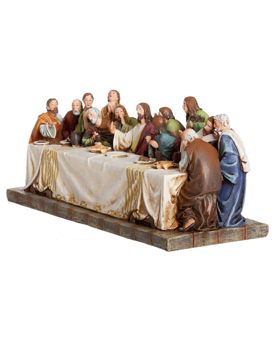 Model of 'The Last Supper' with figures around a table on a white background
