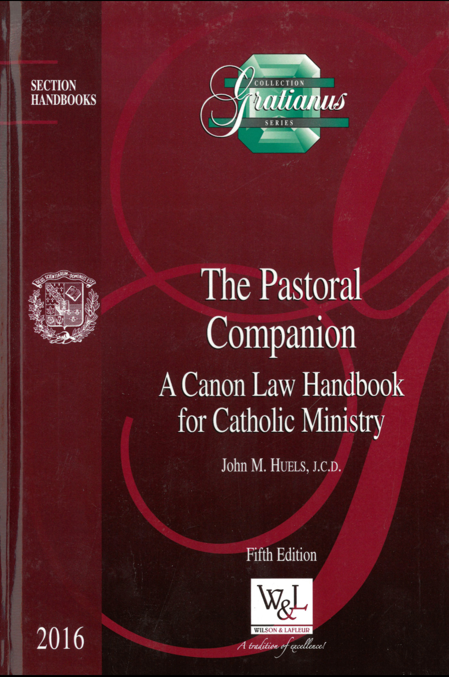 Book titled 'The Pastoral Companion' by John M. Huels, J.C.D. on a red background