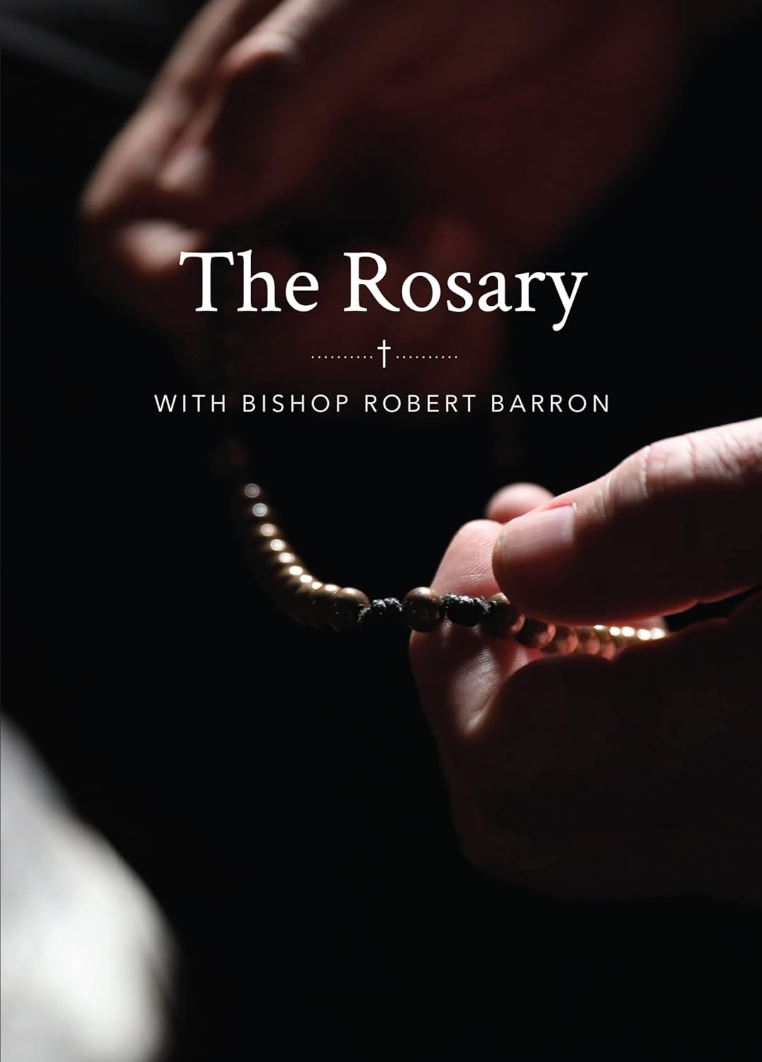Hands holding a rosary with text 'The Rosary with Bishop Robert Barron' on a dark background
