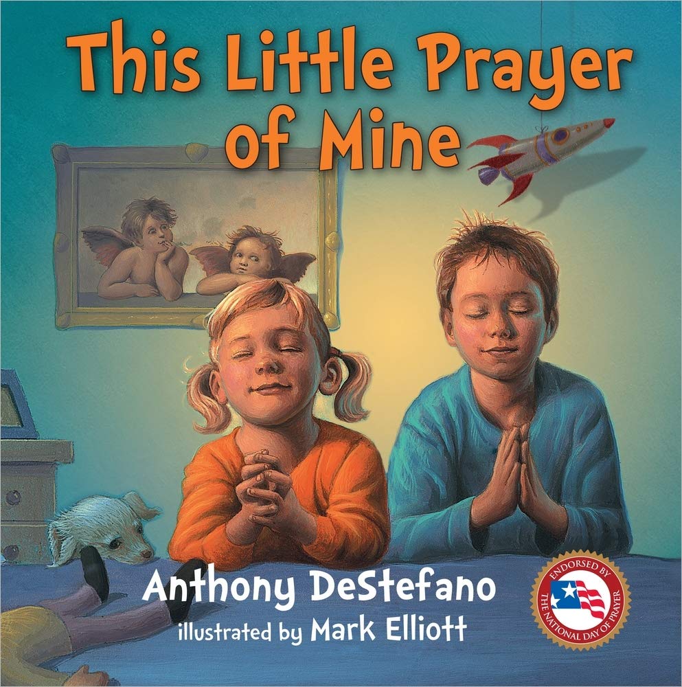 Book cover of 'This Little Prayer of Mine' with two children praying, a fish, and a rocket ship.