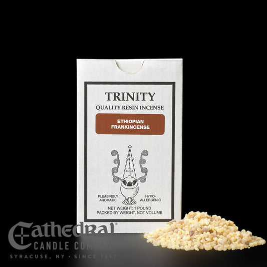 Trinity Quality Resin Incense packaging with incense grains on a black background