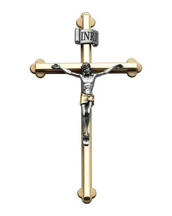 Gold and silver crucifix with 'INRI' on a white background