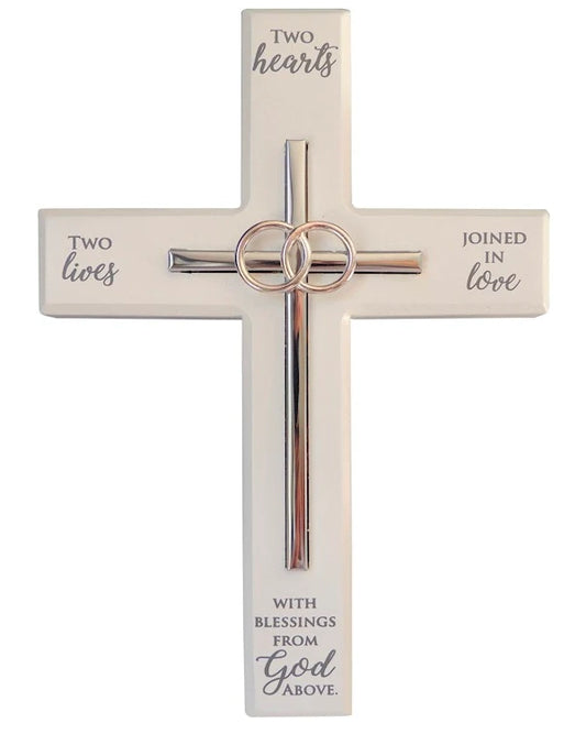 Decorative cross with rings and text on a white background