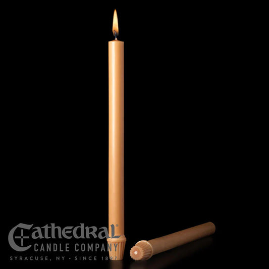 Candle with a lit wick on a black background, featuring the Cathedral Candle Company logo.