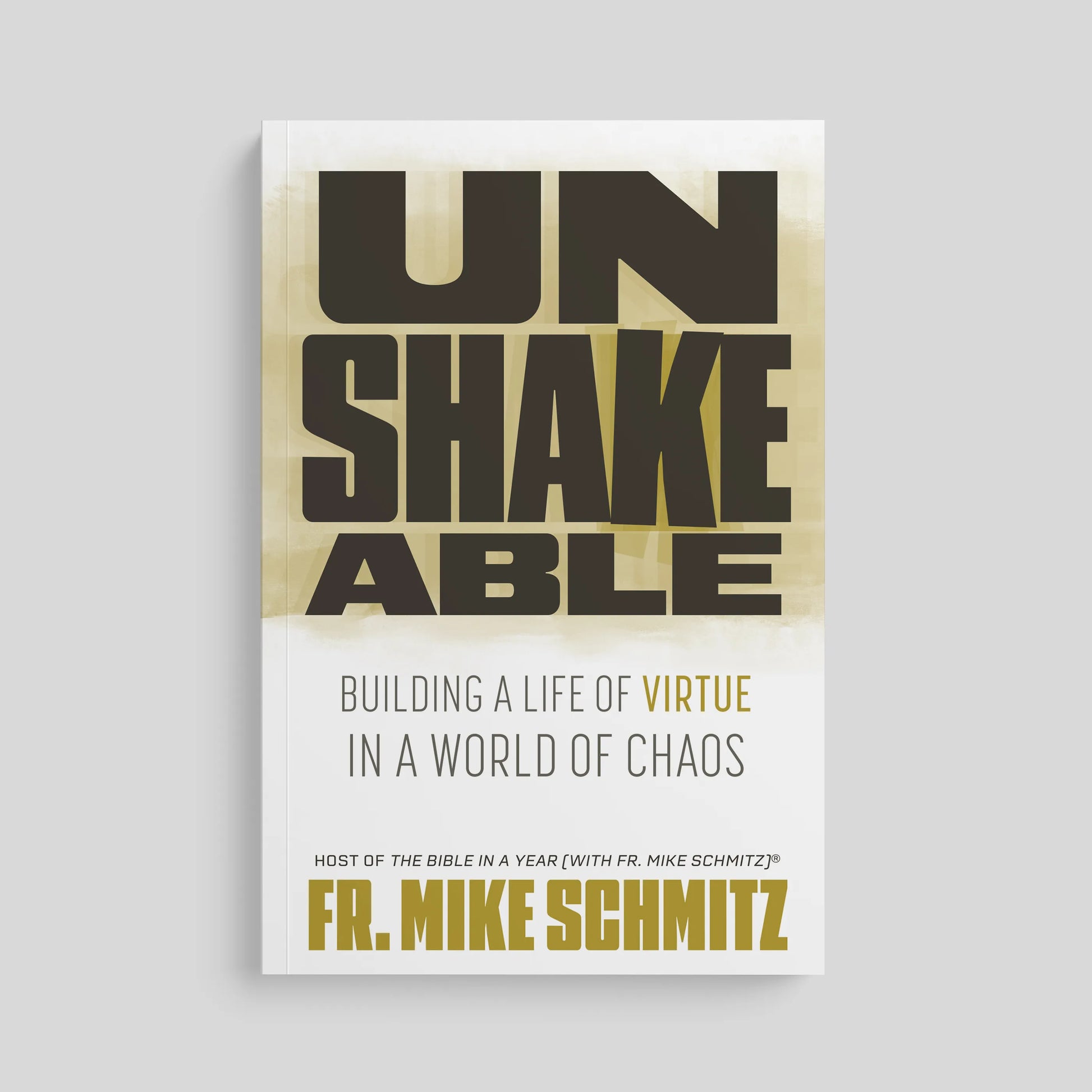Book cover of 'Unshakeable' by Fr. Mike Schmitz on a light gray background