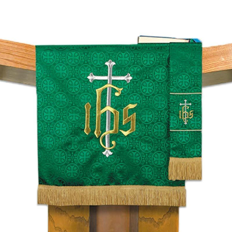 Green liturgical stole with cross and 'IHS' symbol on a wooden stand.