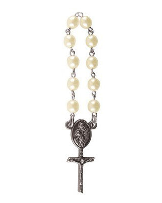 Rosary with white pearls and a metal cross on a white background